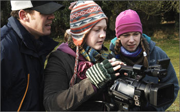 young filmaker using camera